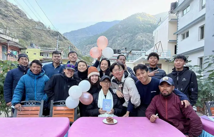 Group photo during hiking through the scenic Langtang Valley in Nepal.