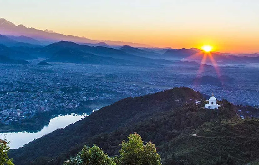 sinrise view in pokhara during 10 days spiritual tour in Nepal.