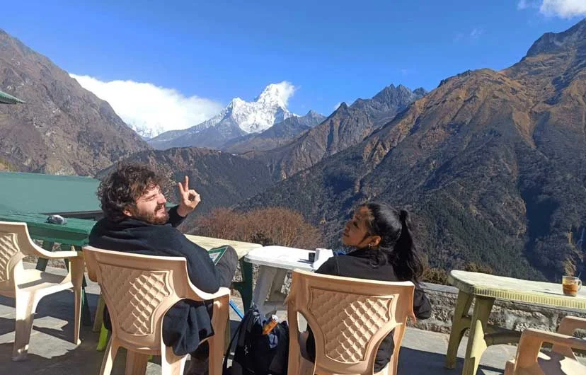Trekker enjoying the view of Aama Dablam during short everest trek.