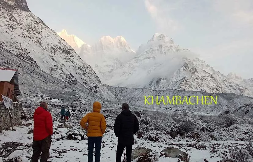 Khambachen village on the Kanchenjunga Base Camp Trek surrounded by towering Himalayan peaks and alpine landscapes in eastern Nepal.